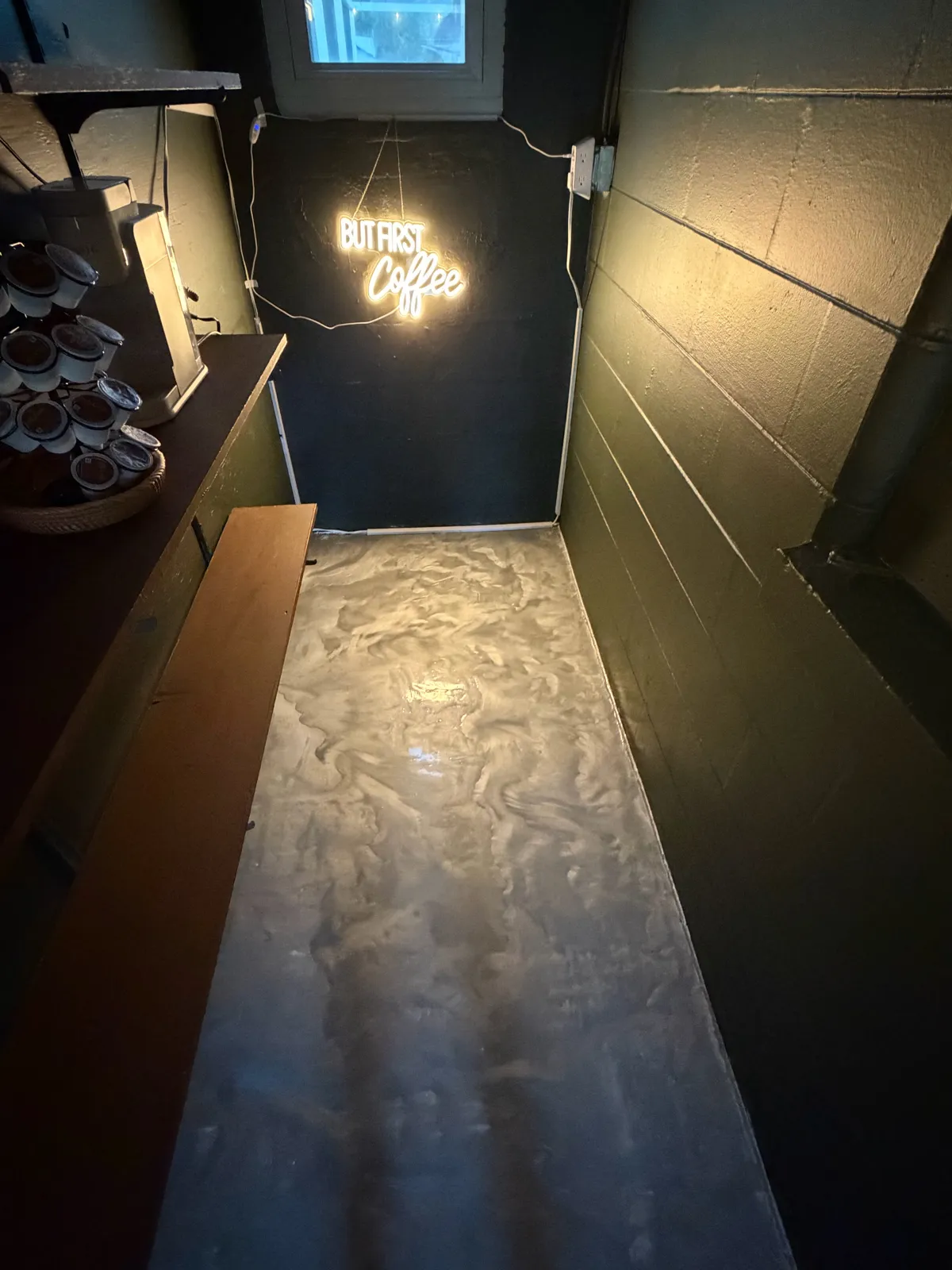 Metallic epoxy floor coating applied in a coffee room in Tampa Bay
